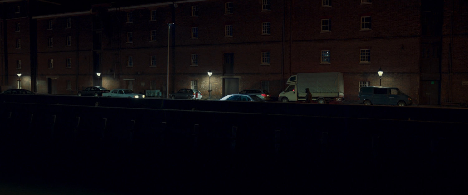 Nick Fury walking along Moscow street at night.