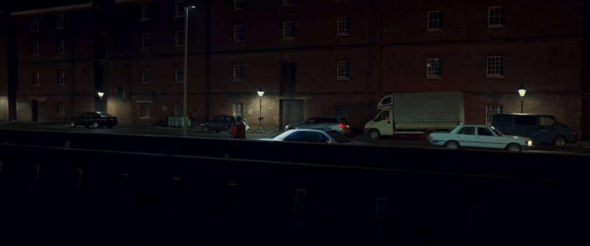 Nick Fury walking along Moscow street at night.