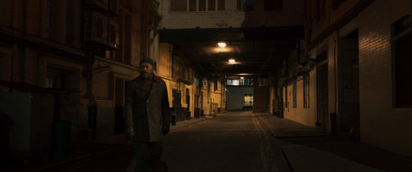 Nick Fury in a dark Moscow alley.