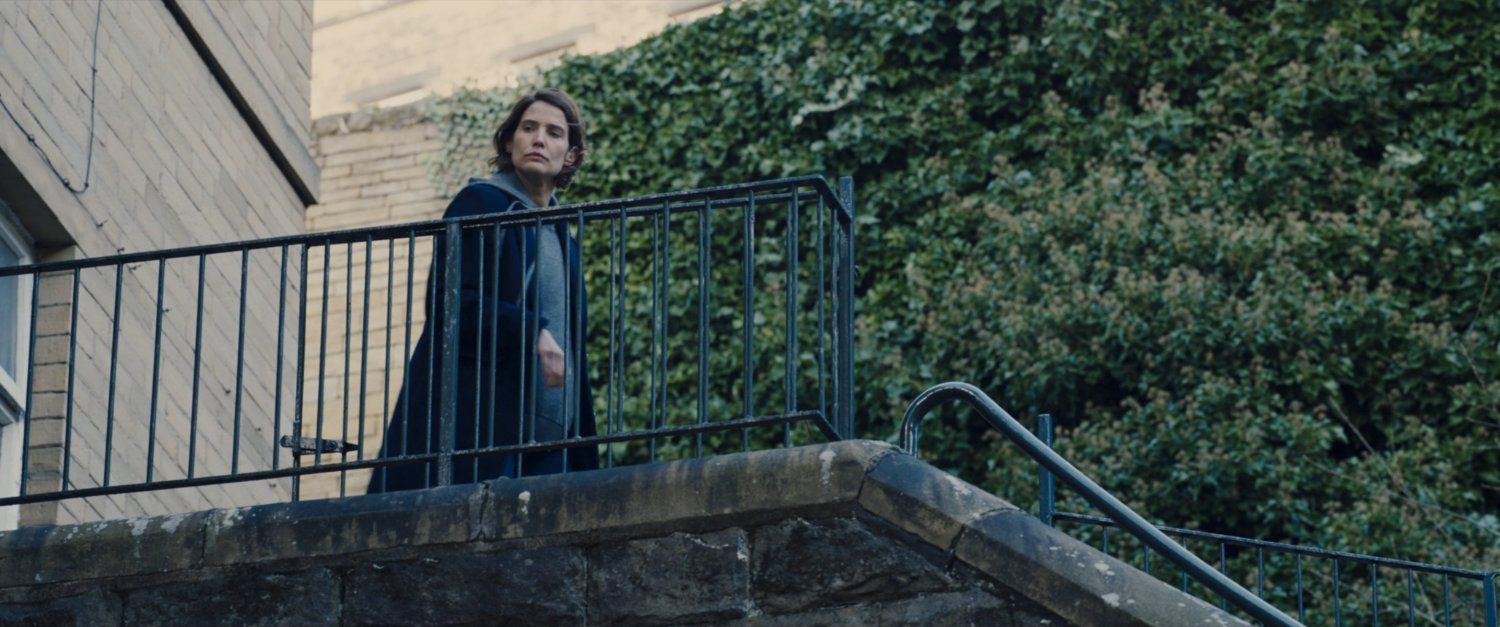 Maria Hill at the top of a stone staircase.