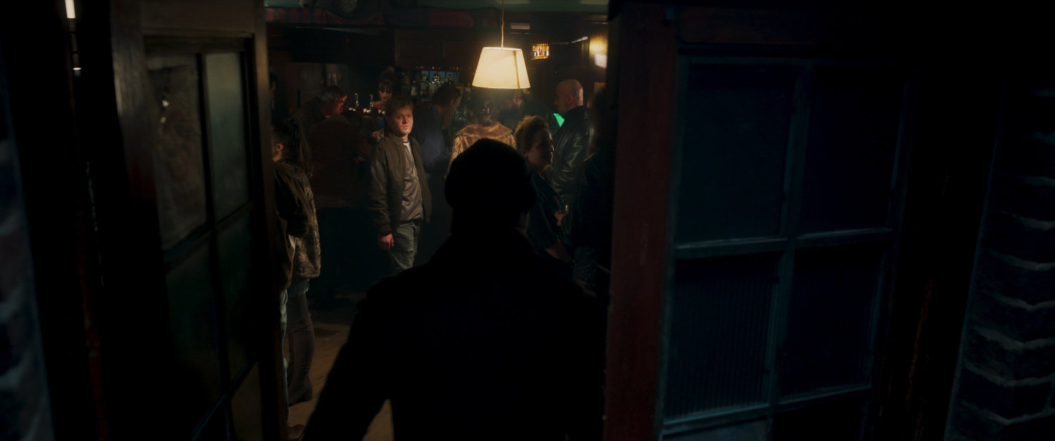 Nick Fury entering a Moscow pub.
