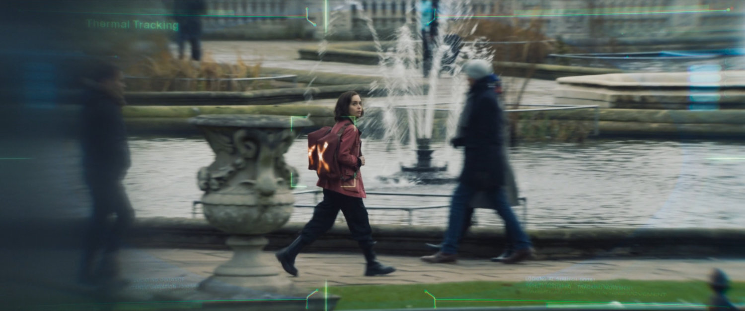 G'iah walking past a fountain in a Russian park.