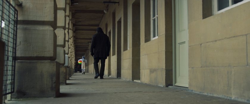 Nick Fury follows a young girl with a rainbow ball.