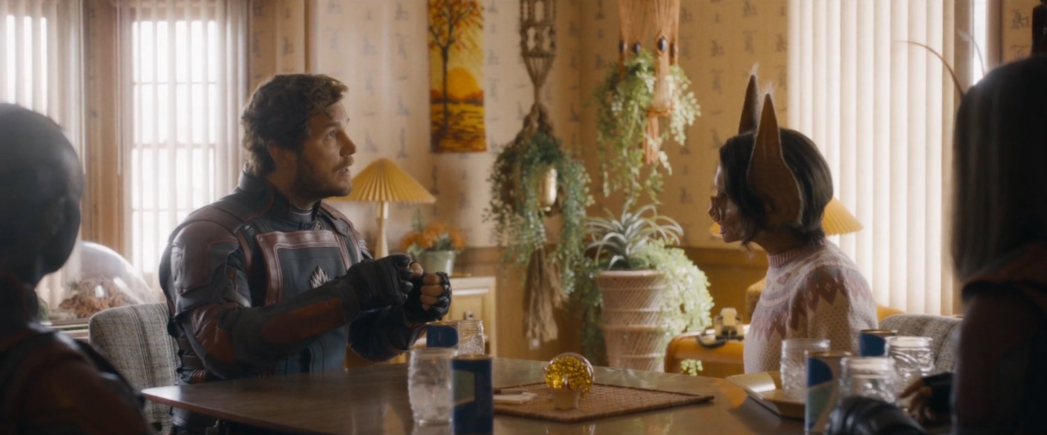Star-Lord attempts to communicate with humanimals inside their home.