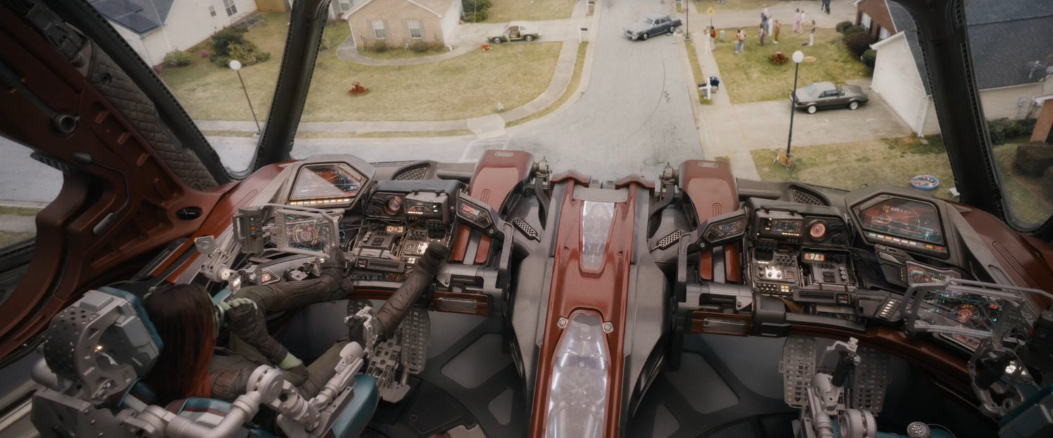 High angle of suburban neighborhood from cockpit of The Bowie.