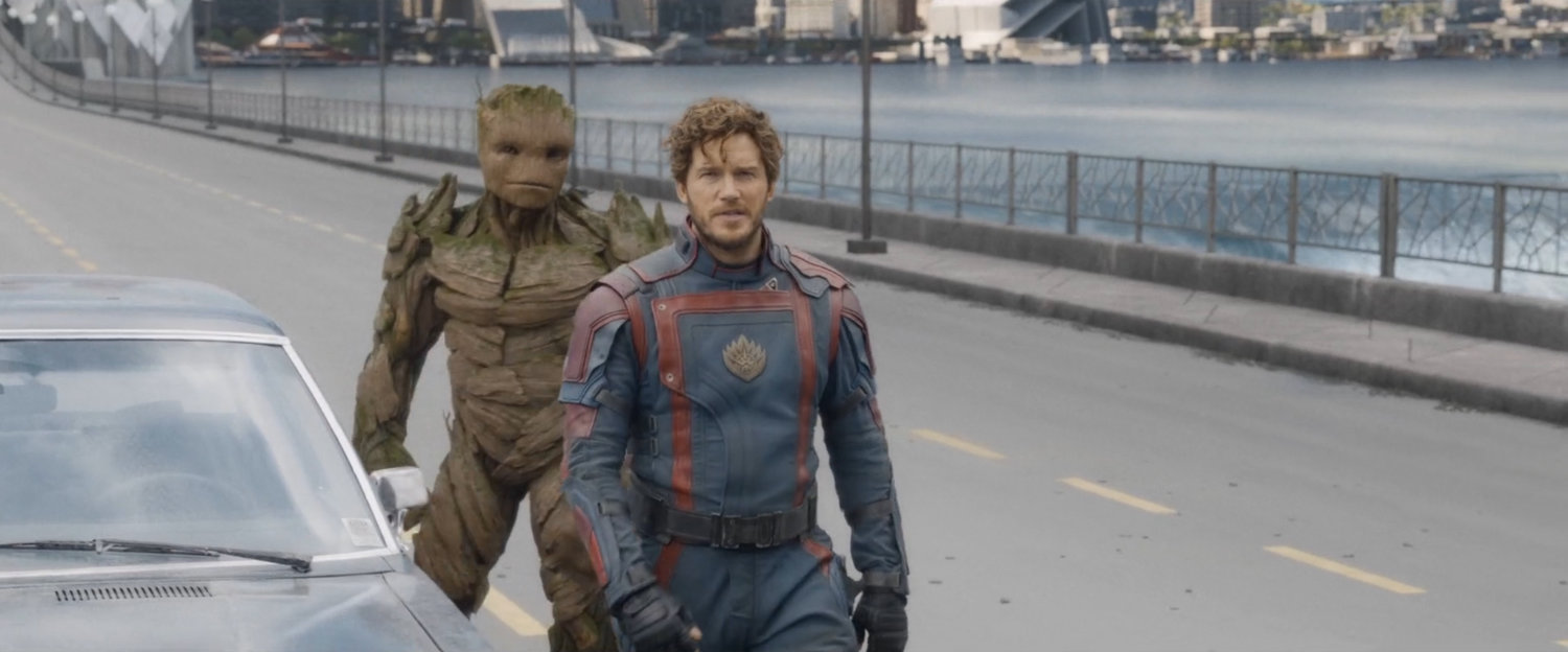 Groot and Star-Lord exit car in front of Arete Laboratories.