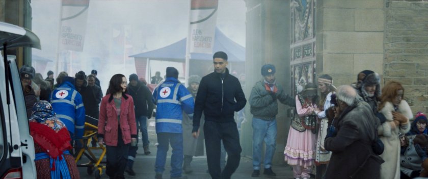 Gravik and G'iah exiting a smoky Moscow square after a bombing.