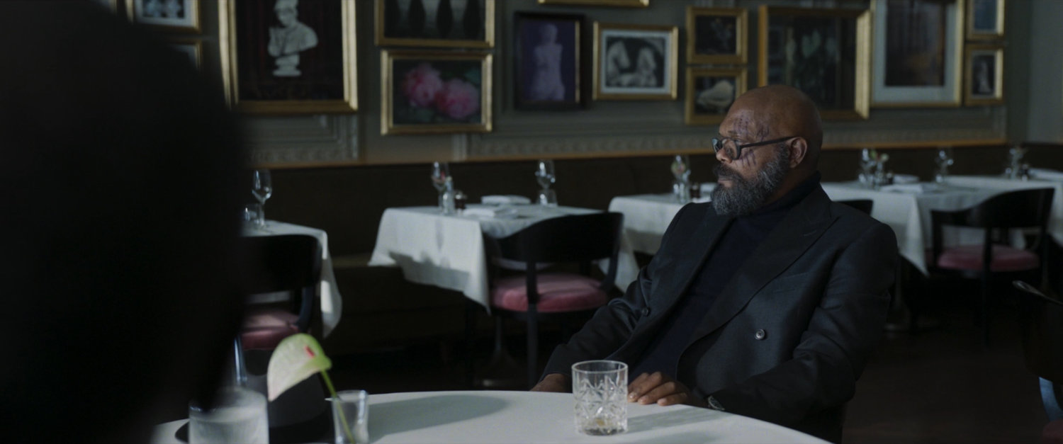Fury talks to Rhodes inside an empty Berners Tavern.