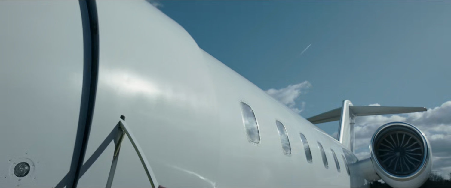A small private plane on a London runway.