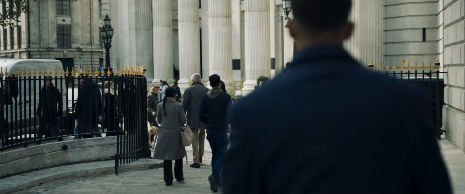 Gravik watches Talos walk away from the London Portrait Gallery.