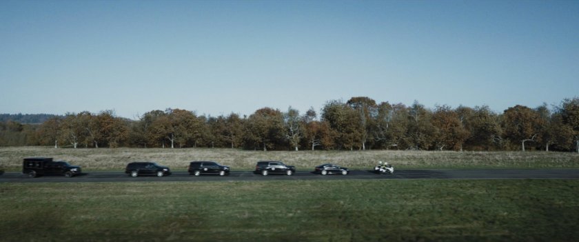A presidential motorcade on a highway.