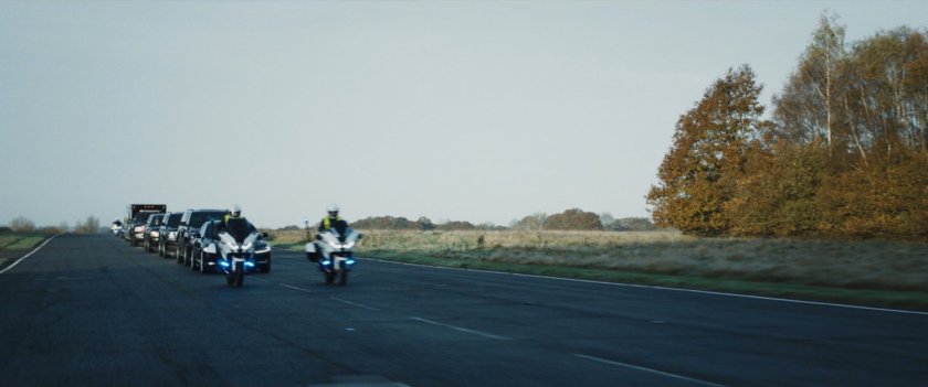 A presidential motorcade on a highway.