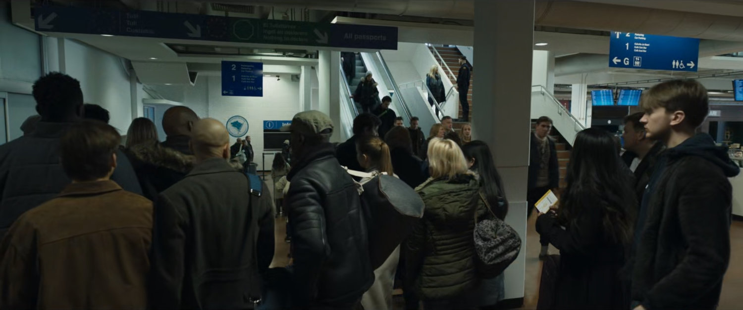 Travelers lined up at Finnish customs.