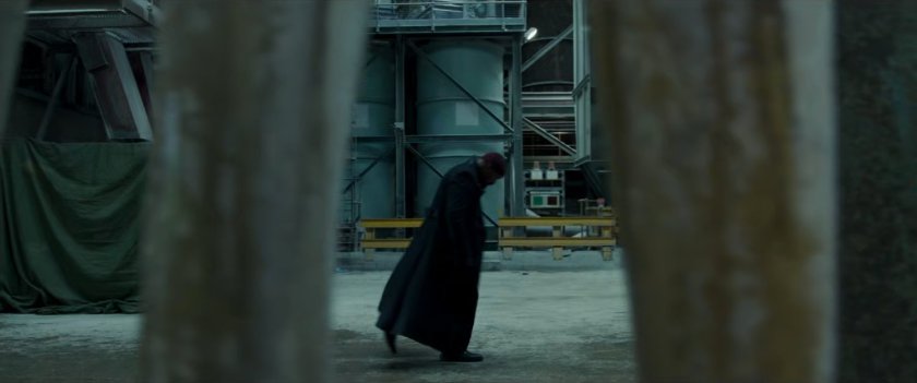 Nick Fury walking through an abandoned New Skrullos facility.