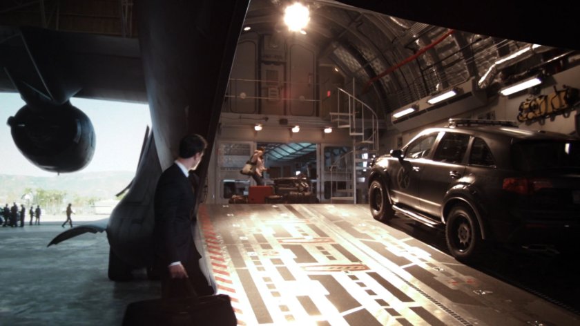 Grant Ward looking at interior of The Bus via loading ramp.