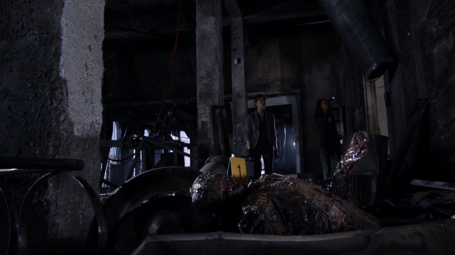 May and Simmons in a bombed out Centipede Lab.