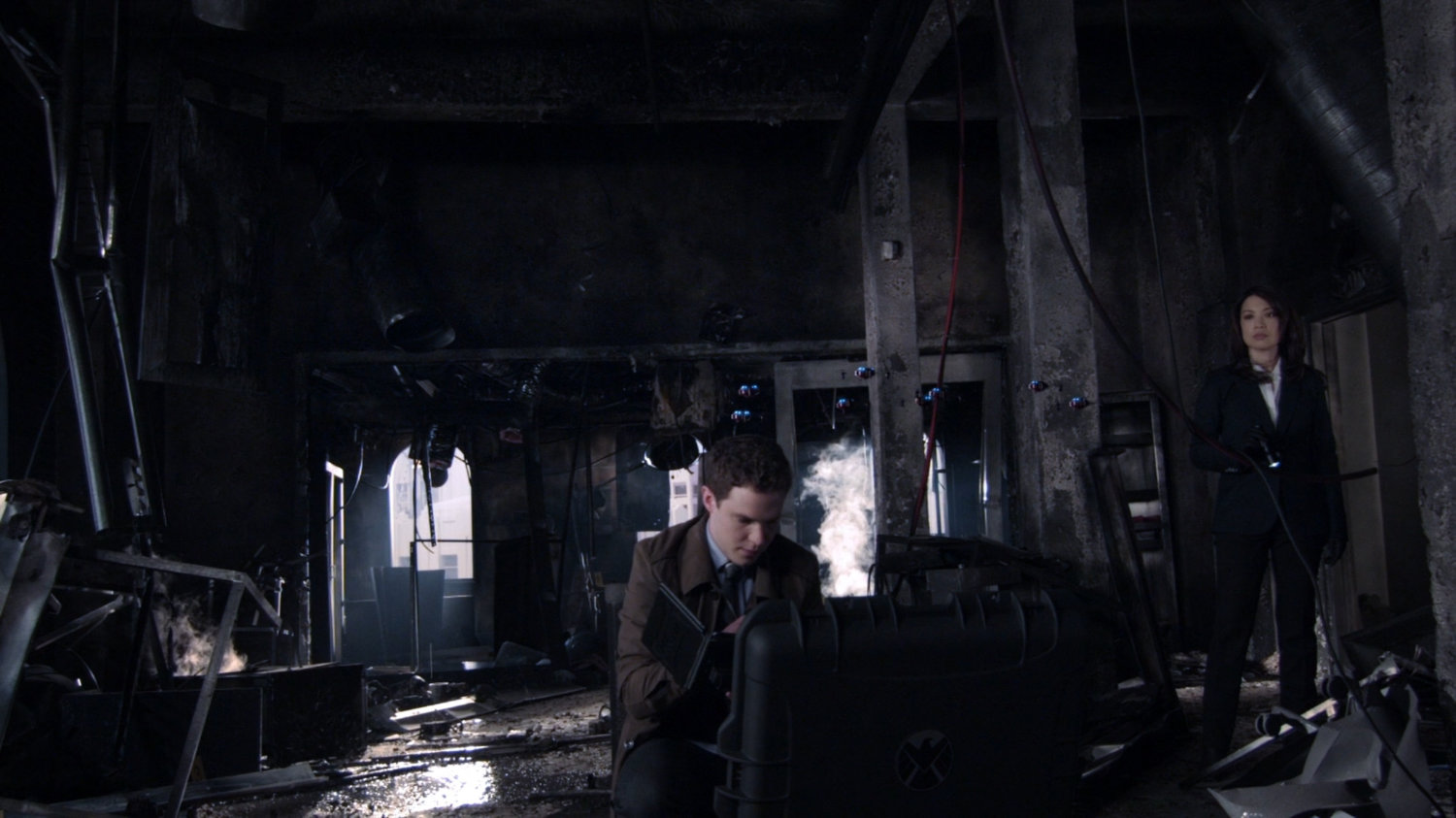 Fitz and May in a bombed out Centipede Lab.