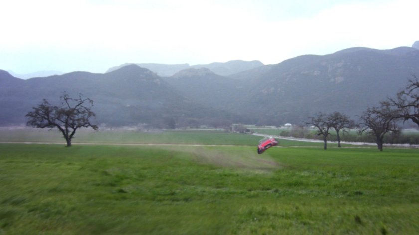 Lola flying away over Peterson farm.