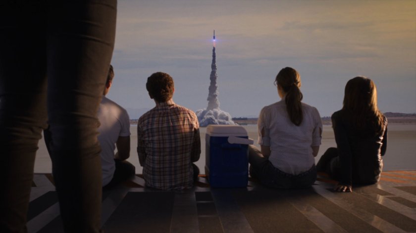 The Agents watching a rocket blast off from The Slingshot.