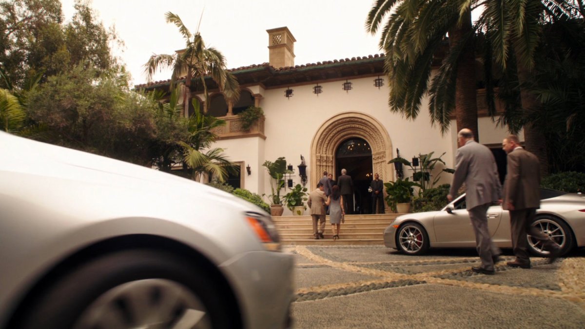 Exterior Ian Quinn's estate front driveway and door.