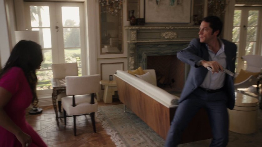 Ian Quinn pulls a gun on Skye inside his estate.