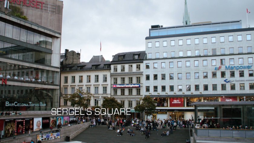 View of buildings and steps in Sergel's Square located in Stockholm Sweden. Text: Sergel's Square.