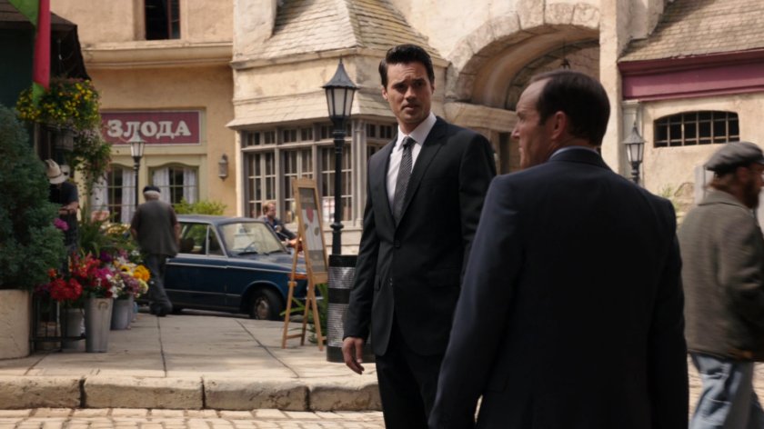 Ward and Coulson in a small town square in Zloda.