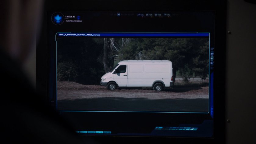 POV view of white van on computer monitor.