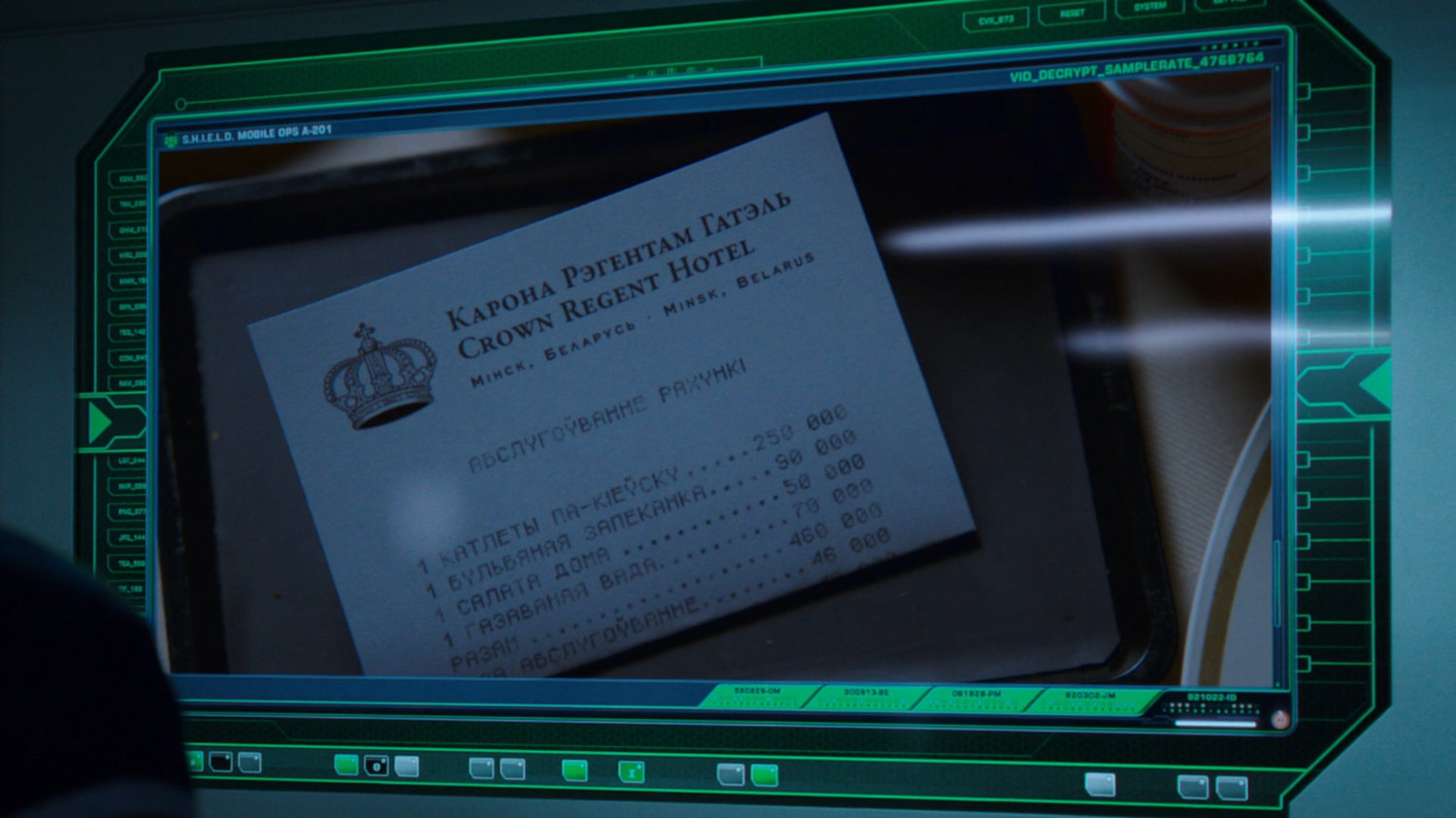 Image of receipt from the Crown Regent Hotel on a computer monitor.