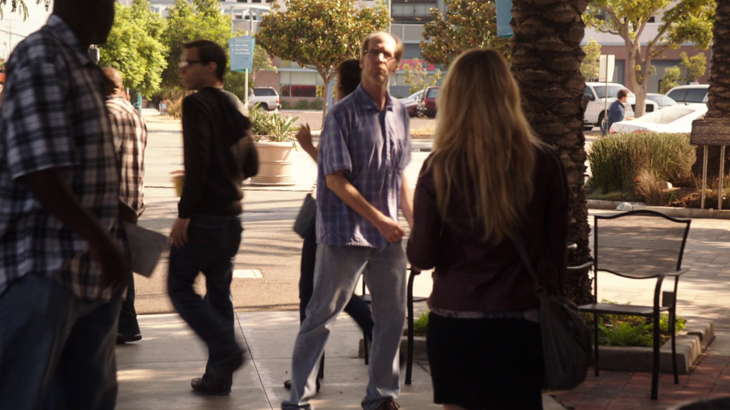 Pedestrians on Austin sidewalk.