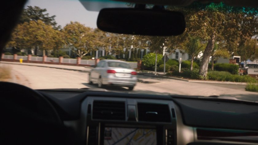 Car chase on Austin street from POV of following car.