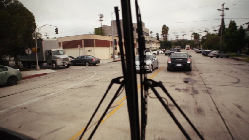 POV of Austin street from inside city bus.