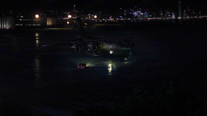 Nighttime view of The Bus on Hong Kong Airfield.