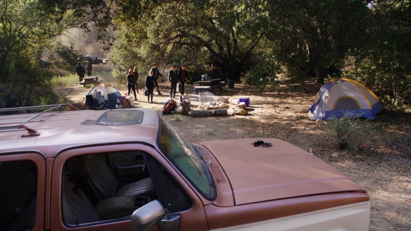 SHIELD Agents inspect a Ranger Scout camp in the morning.