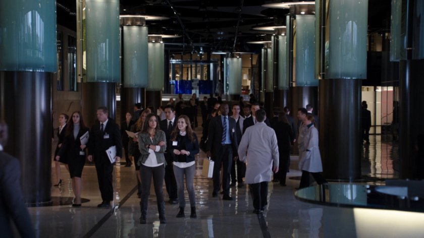 Skye and Simmons in the main hallway of The Hub.