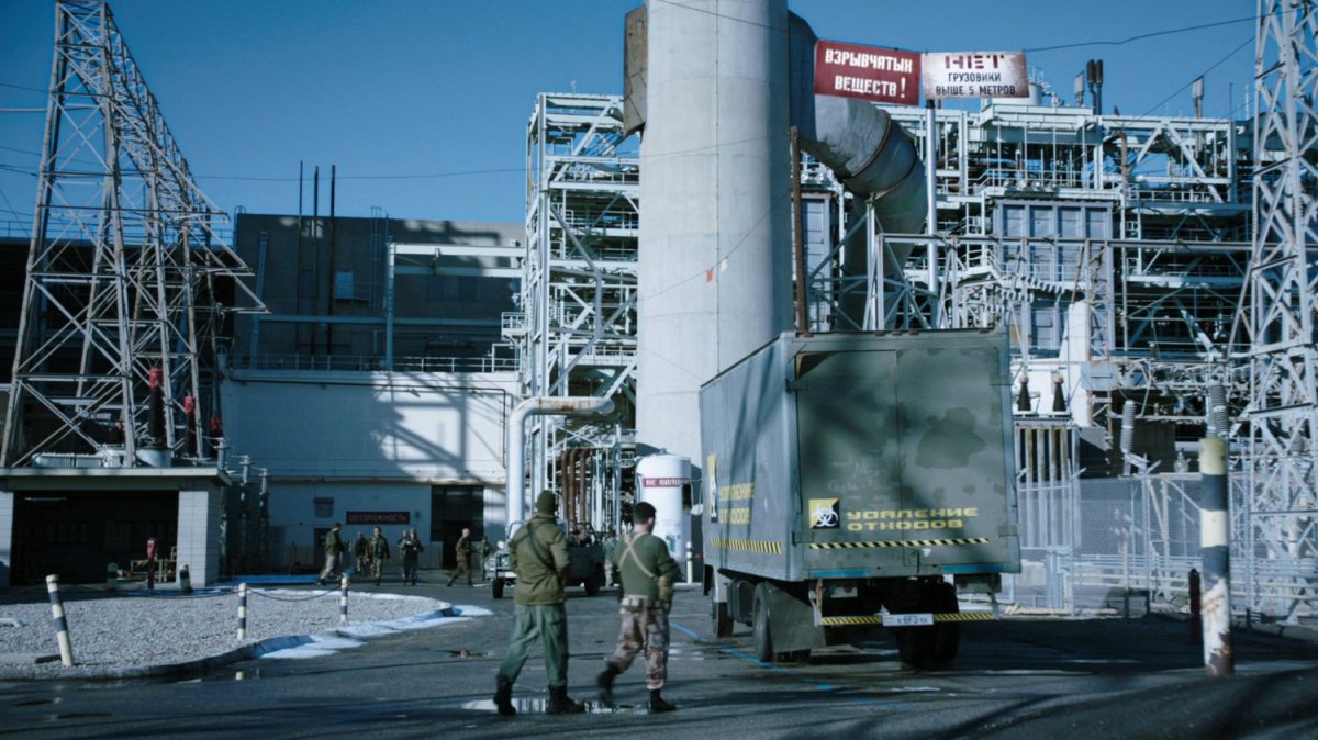 A waste disposal truck pulls up at a Georgian power plant.