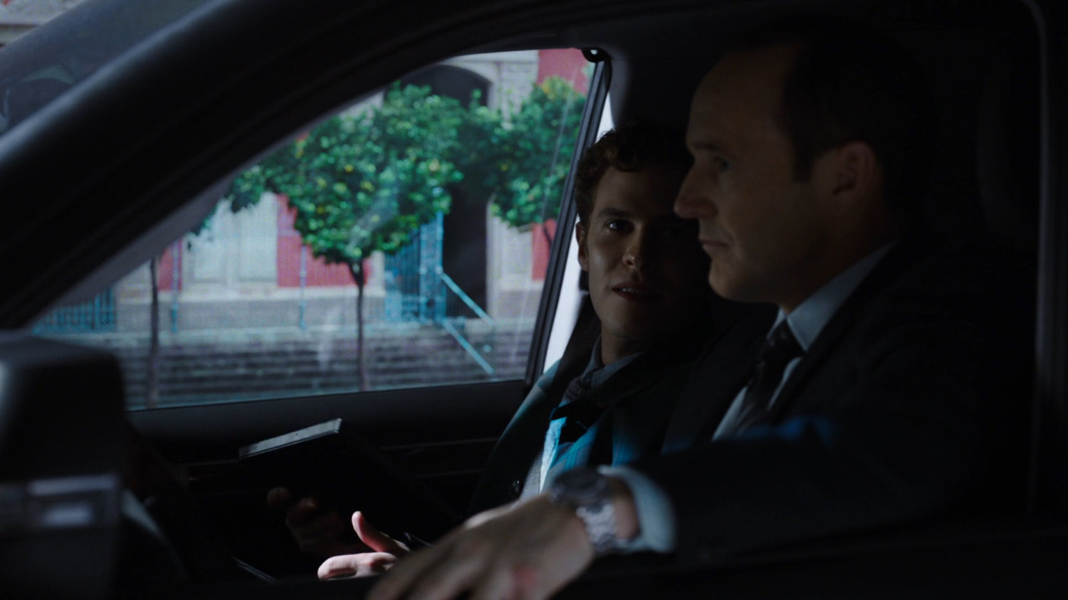 Fitz and Coulson in car in front of church in Plaza Salvador, Seville.
