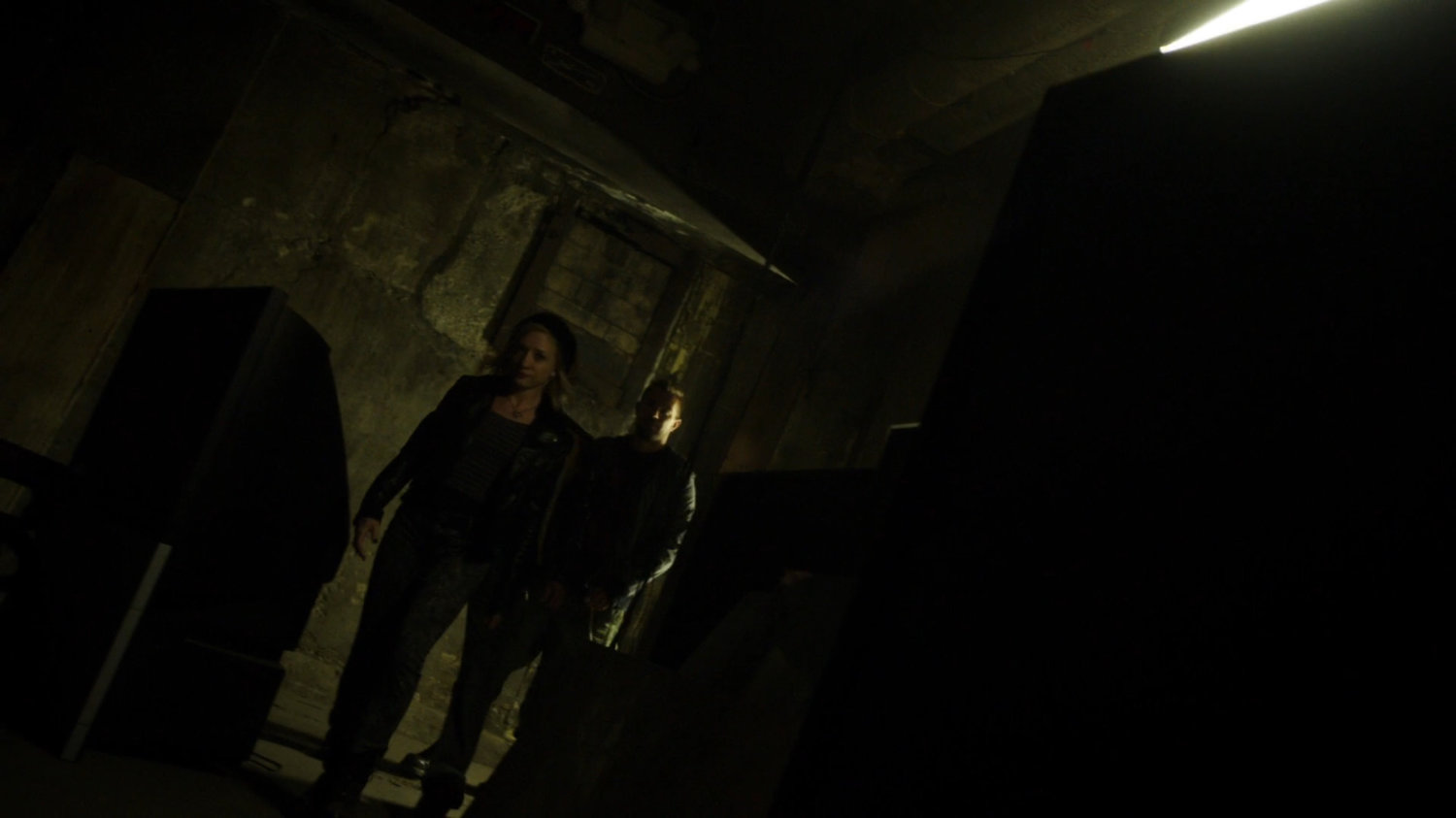 Petra and Jakob in dark underground fight club.