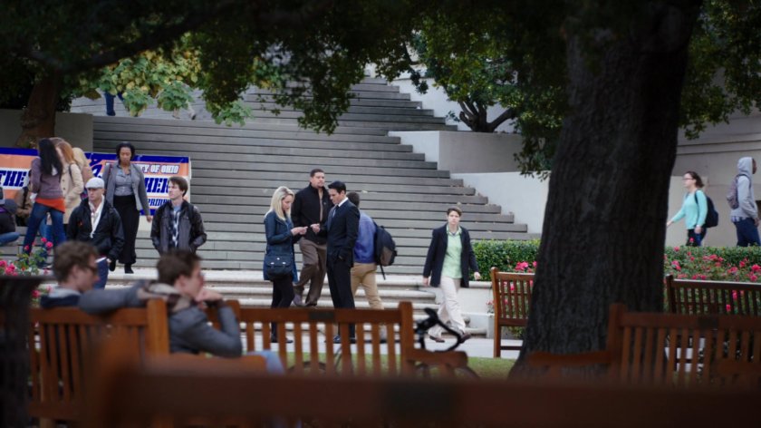 Long shot of Ward talking to Laura Hayward at the University of Ohio.