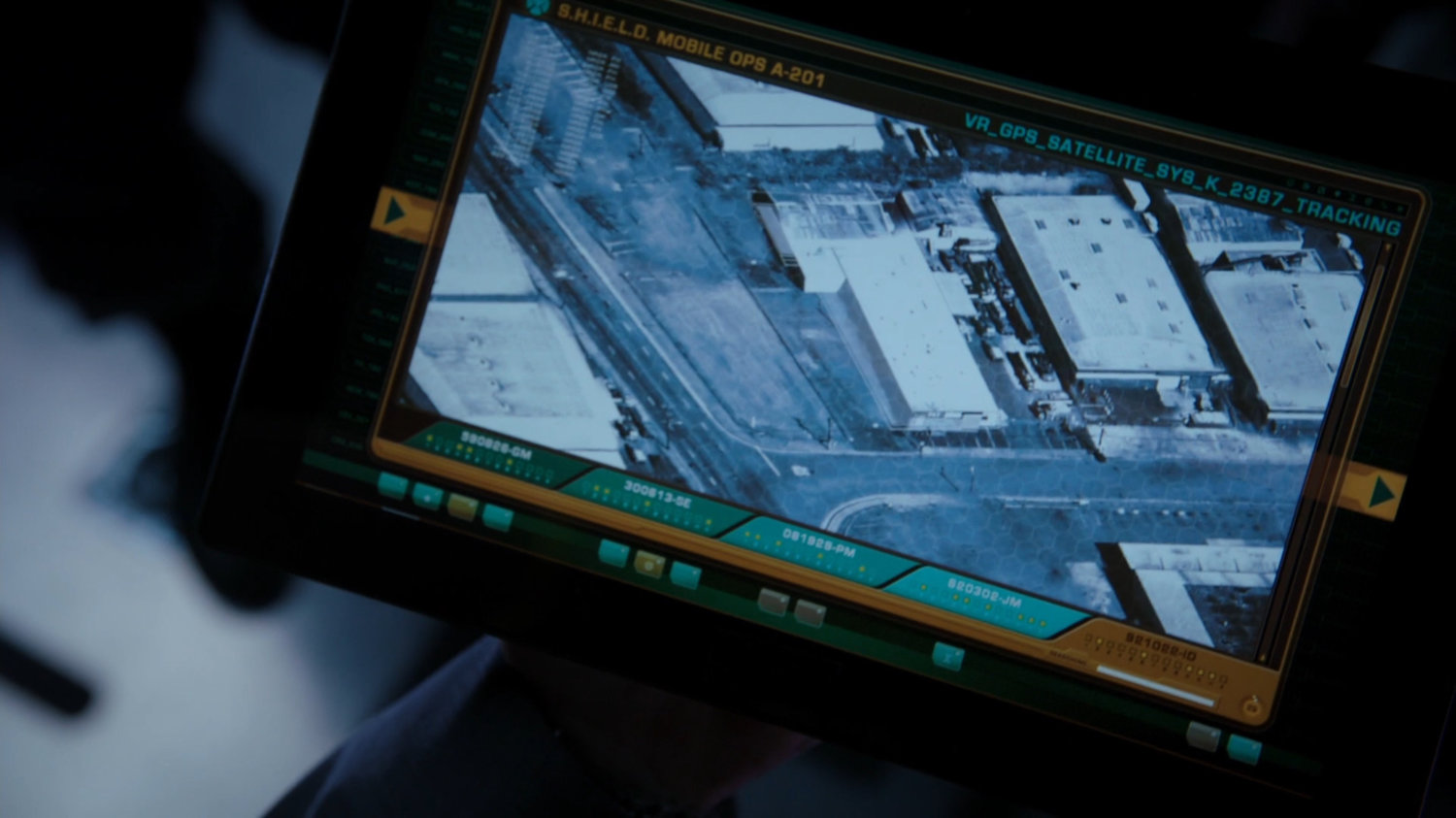 Aerial of Oakland factory on a tablet screen.
