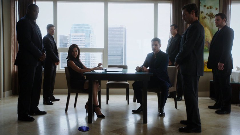 Emily Deville meets with VanChat, and his security team, in a high rise building.
