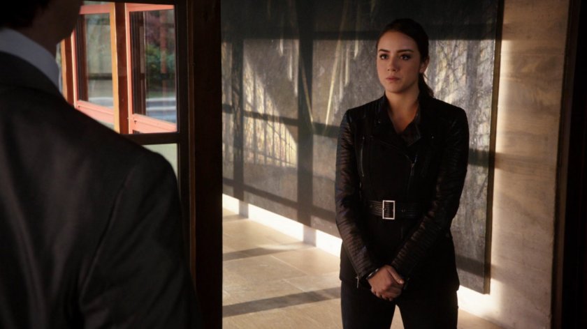 Skye confronts Lloyd Rathman in his entryway.