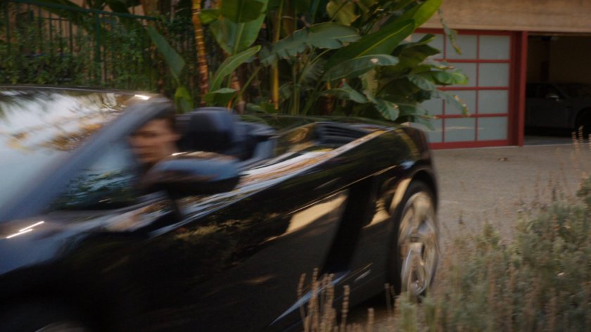 Skye speeds away from Lloyd Rathman's house in a sports car.