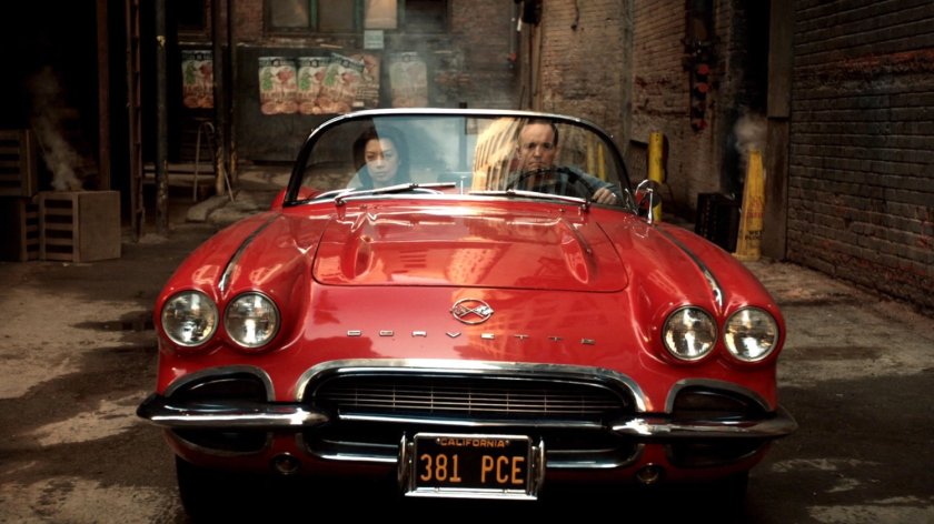 May and Coulson sit in Lola in a Mexico City alley.