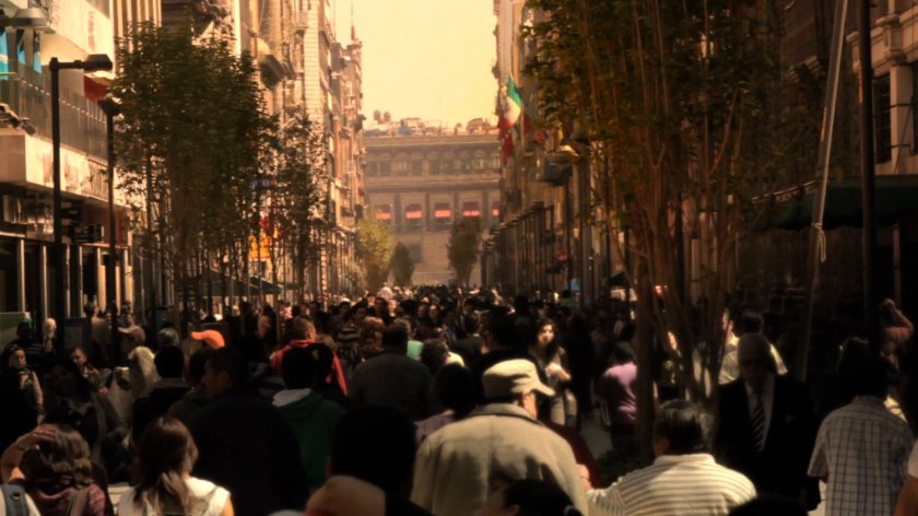 Long shot of crowded Mexico City street.