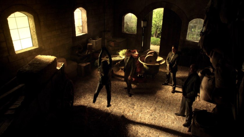 May being tortured by men inside of Italian villa gatehouse.