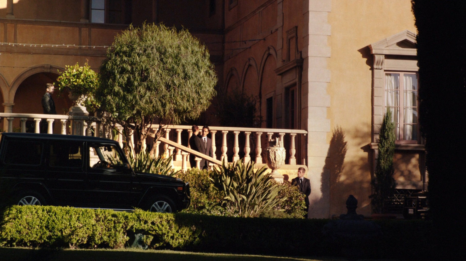 Guards in front of Italian villa.
