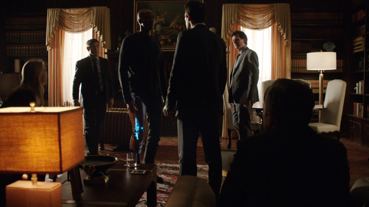 Mike Peterson and men in Italian Villa study.