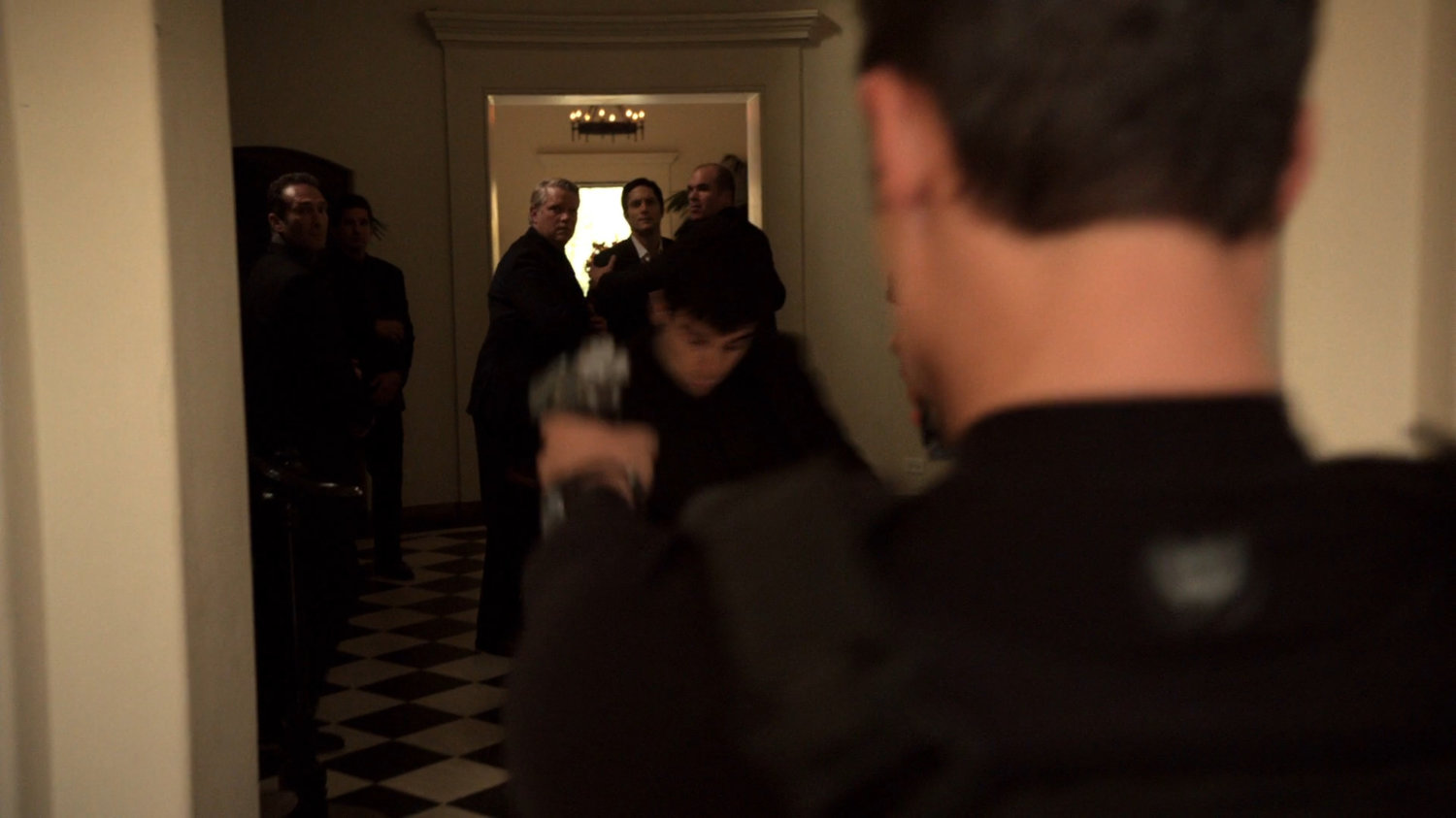 Agent Ward gunning down men in Italian villa.