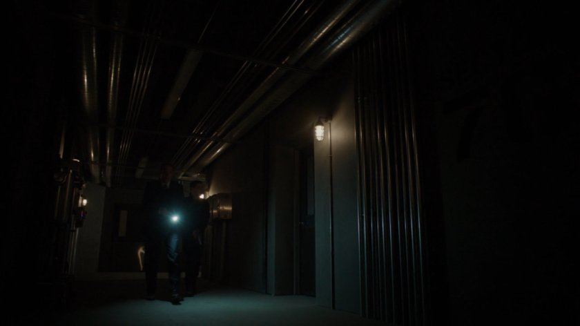 SHIELD agents in the tunnels of the Guest House.